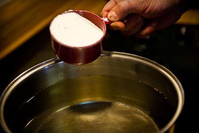 add sugar to boiled water